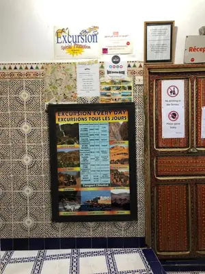 a bulletin board on a wall in a room at Hotel Medina in Marrakech