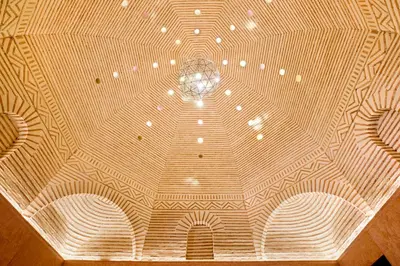 a ceiling with a chandelier on top of it at Dar Rhizlane, Palais Table d'hôtes & SPA in Marrakech