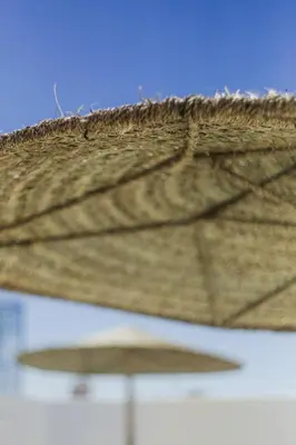 a close up of the top of a wooden umbrella at Riad 46 in Marrakech