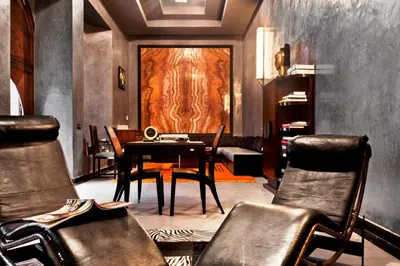 a dining room with a table and chairs at Villa Makassar in Marrakech