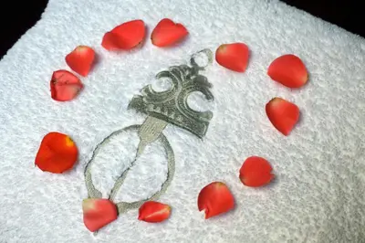 a drawing of a heart with a ring and red hearts at Riad Belle Epoque in Marrakech