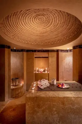 a room with a bed with a circular ceiling at Riad & Spa Bahia Salam in Marrakech