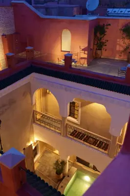an overhead view of a building with a pool at Riad Dar Ten in Marrakech