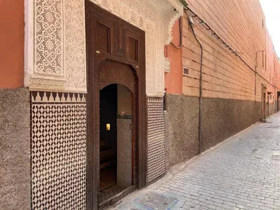 an entrance to a building with an open door at Dar Taliwint in Marrakech