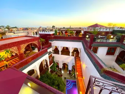 an aerial view of a building with balconies at Riad La Perle Rouge in Marrakech