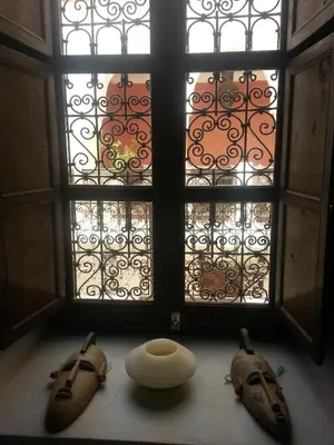 a room with two windows and two objects on a table at Riad AZZA in Marrakech