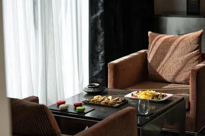a table with a tray of food on a table at Cesar Resort & Spa in Marrakech