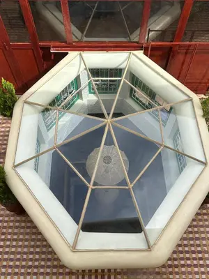 a view of a building with a glass window at Riad Tasneem in Marrakech