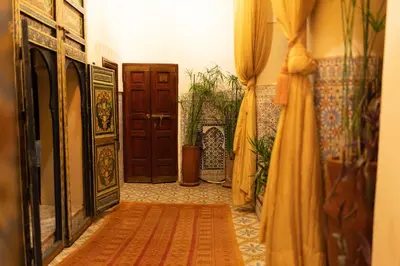 an empty hallway with a door and a rug at Abelia Riad - 2025 Guest Choice Award in Marrakech