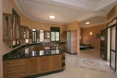 a large bathroom with a sink and a counter at Villa Zahra Palmeraie in Marrakech