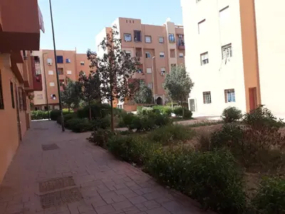 a walkway in front of a building at Relaxation apartment in Marrakech