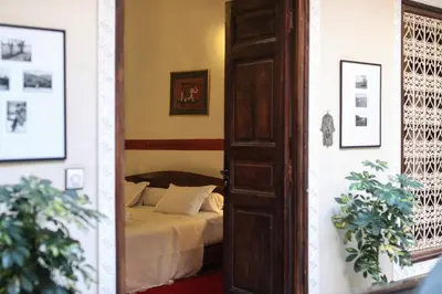 a door leading to a bedroom with a bed at Riad Marhbabikoum in Marrakech