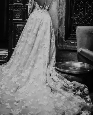 a black and white photo of a bride in a wedding dress at Dar Darma in Marrakech