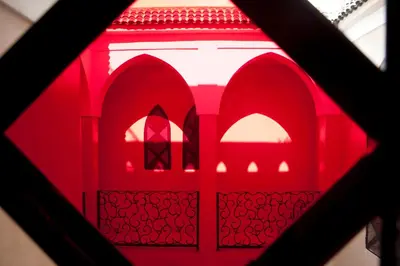 a red light in a window of a building at Riad Le Rubis in Marrakech