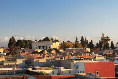 a view of a city with mountains in the background at Dar Warda in Marrakech