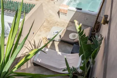 an overhead view of a patio with a swimming pool at Riad Dar Tmania in Marrakech