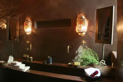 a room with a table with a christmas tree on it at Riad Golfame in Marrakech