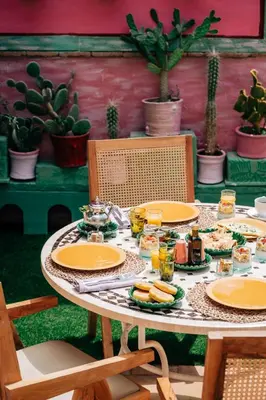 a table with plates of food on top of it at La Villa Des Golfs & PinkCactus in Marrakech