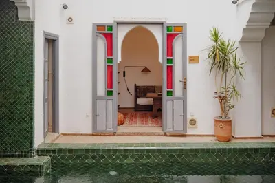 an entry to a house with doors open at Outsite Marrakesh in Marrakech