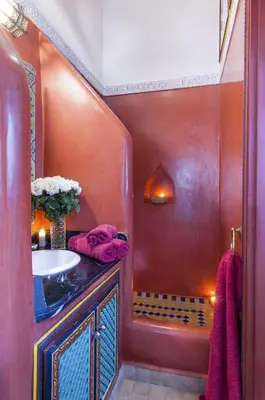 a bathroom with a sink and a shower at Riad Tamarrakecht in Marrakech