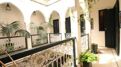 a balcony of a house with plants at Riad Kasbah Baraka in Marrakech