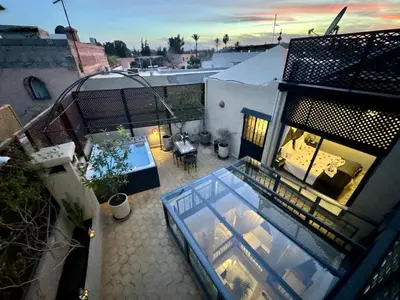 an aerial view of a balcony of a building at Riad ART DE VIVRE avec Jacuzzi in Marrakech