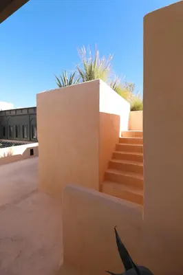 a set of stairs in a building with a stair case at Riad Zaouia 44 in Marrakech
