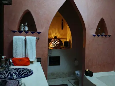 a bathroom with a sink and a toilet at Riad 58 Blu in Marrakech