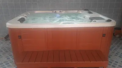 a hot tub in the middle of a bathroom at Appartements Ziad Guéliz in Marrakech