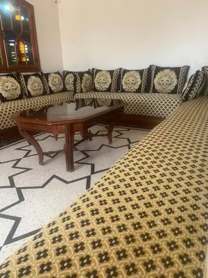 a living room with a couch and a coffee table at GoodLife House in Marrakech