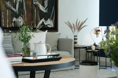 a living room with a couch and a coffee table at Villa BELYA in Marrakech