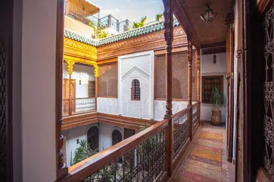a balcony with a view of a building at Riad Melhoun & Spa in Marrakech