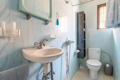 a bathroom with a sink and a toilet at Appart Atlas in Marrakech