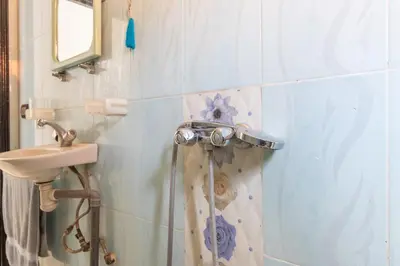 a bathroom with a shower and a sink at Appart Atlas in Marrakech