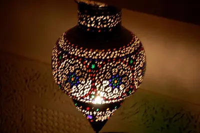 a large glass vase filled with millions of lights at Riad Massiba in Marrakech