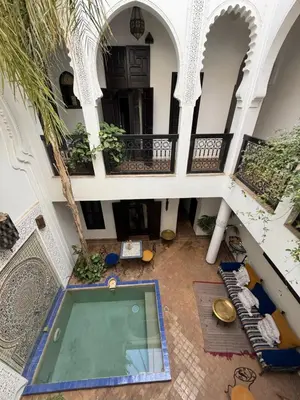 an overhead view of a building with a swimming pool at Dar Fangui in Marrakech