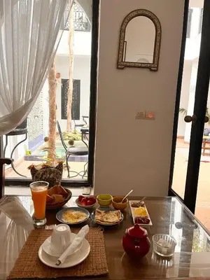 a table topped with plates of food on a table at Dar Fangui in Marrakech