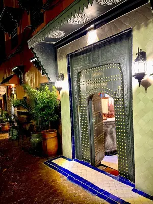 an entrance to a building with an arch doorway at Riad Hotel Sherazade in Marrakech