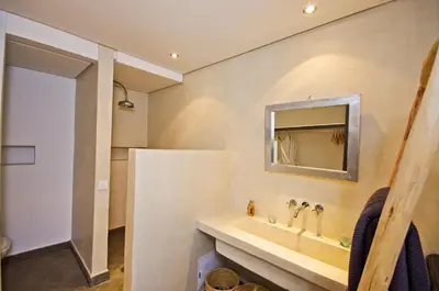 a bathroom with a sink and a mirror at Riad Kasbah 117 in Marrakech