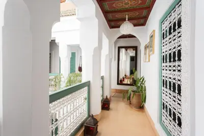 a hallway of a house with white walls and a ceiling at Riad Swaka in Marrakech