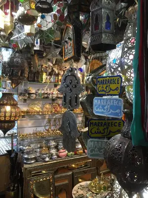 a shop in a market with many different items at Riad Le Marrakech Berrima in Marrakech