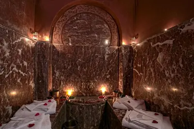 a room with a table with candles in it at RIAD DREAMS in Marrakech