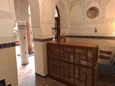 a room with a wooden altar in a building at Dar Al Kounouz in Marrakech