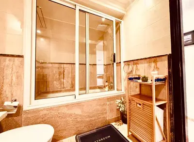 a bathroom with a shower and a toilet and a sink at Cosy stays central apartements , guéliz Marrakech in Marrakech