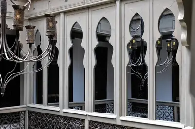 a window of a building with lights in it at Riad L'Evidence in Marrakech