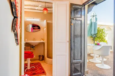 a bathroom with a sink and a toilet at Maison Du Tresor in Marrakech