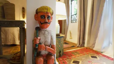 a statue of a man with a face painted on it at Riad Lyla in Marrakech