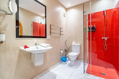 a bathroom with a toilet and a sink and a shower at Maison KA in Marrakech