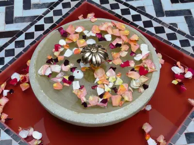 a plate of candy on a table at Riad les Rêves d'Amélie in Marrakech