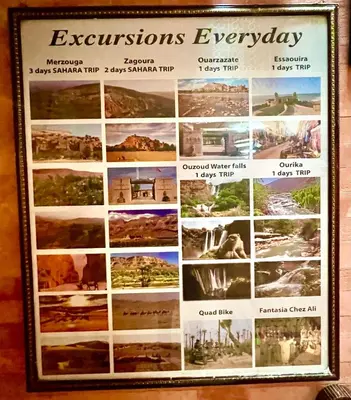 a framed picture of the descriptions of excursions everyday at Riad Maison Aicha in Marrakech